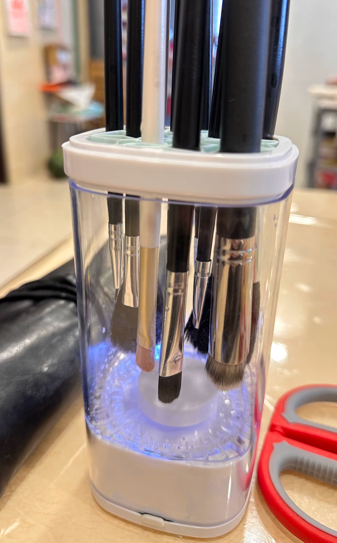 Sample review close-up photo of brushes inside the white Nuvie cleaner